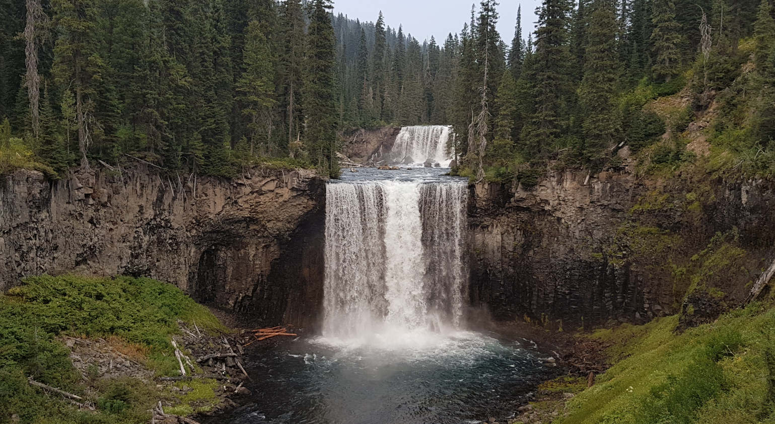 Photo of wilderness waterfall (Iris Falls in Yellowstone)