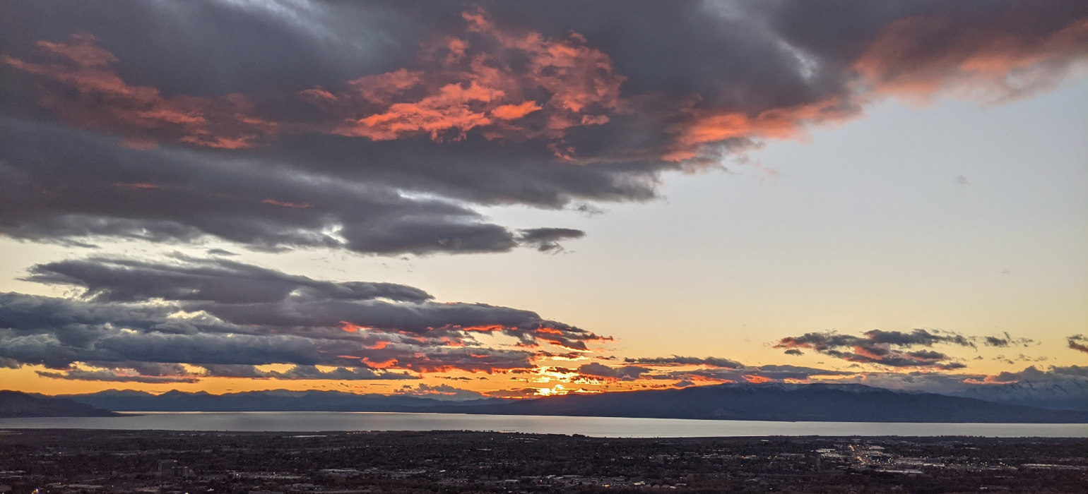 Sunset over lake and mountains