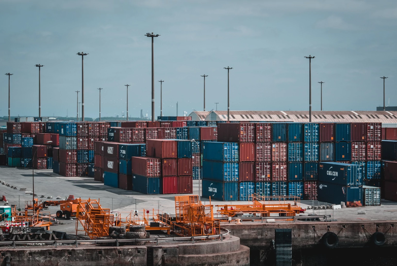 Shipping containers stacked at a port