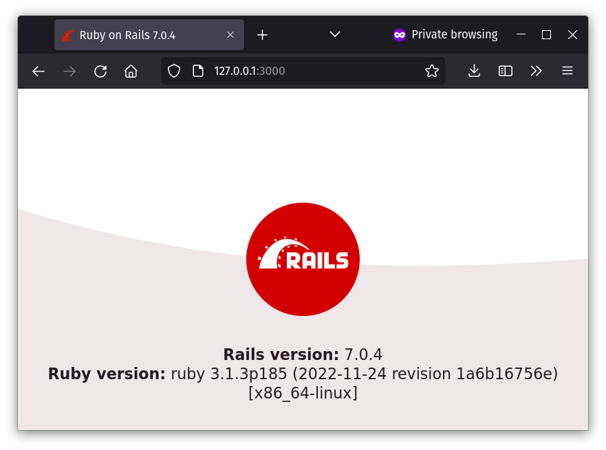 Hello Rails. A browser navigated to http://127.0.0.1:3000/, with the webpage displaying the Rails logo, and underneath reading “Rails version: 7.0.4”; “Ruby version: ruby 3.1.3p185 (2022-11-24 revision 1a6b16756e)[x86_64-linux]