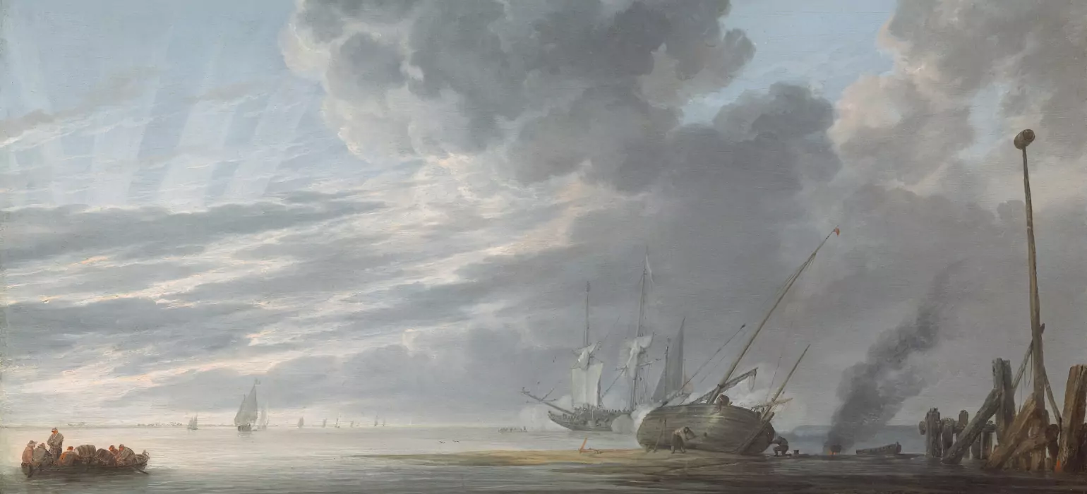 A painting of a Dutch port at the end of the day. On the left, sunlight peeks out from clouds low on the horizon, casting rays of light into the light blue sky of the fading day. Trading ships sail the waters, with some disappearing into the horizon. In the foreground, a smaller boat of people and barrels is rowed to an outcropping of land, on which is a boat being tarred by two sailors. A small fire heats a pot next to wooden dock equipment which protrudes into the air.