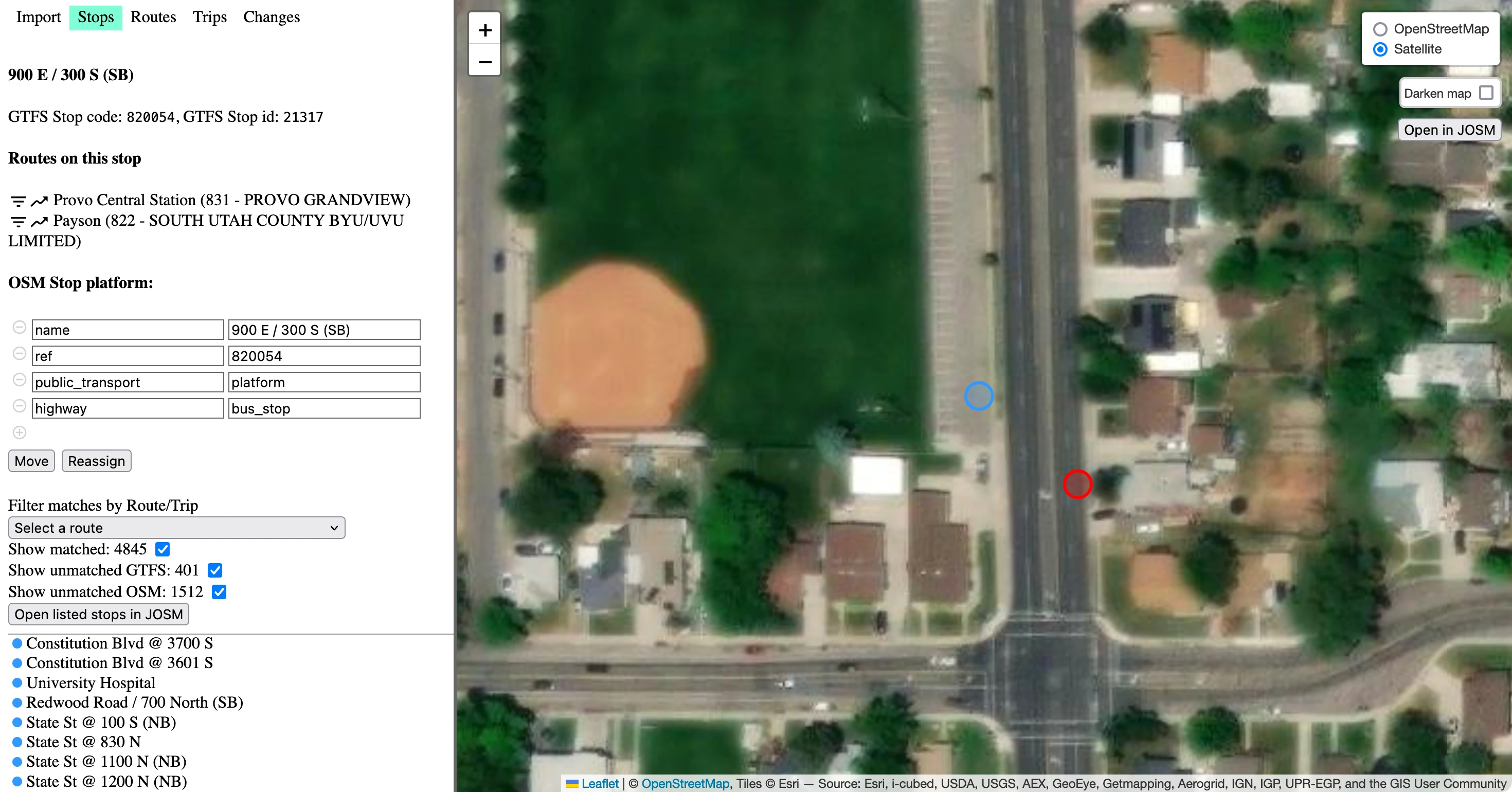 The OSM editing app. The map is showing satellite imagery. A blue stop is selected, with options on the left to move or reassign the stop, as well as OSM data: “name: 900 E / 300 S (SB), ref: 820054, public_transport: platform, highway: bus_stop”. This data is in a two-column editable table.